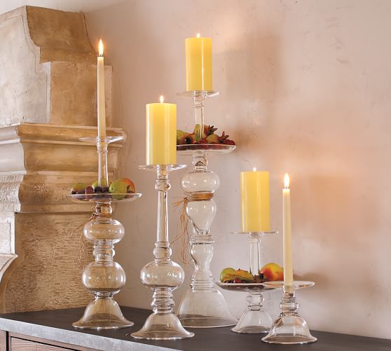 What are a few retailers that offer glass candle globes?